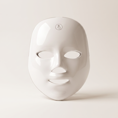 Six Thirty LED face mask, front view on a bone-white background, switched off